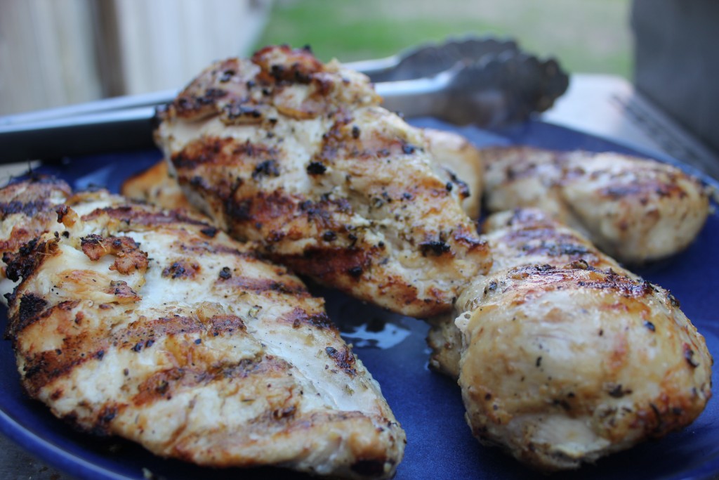 Grilling chicken breast shop on gas grill